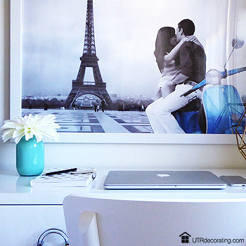 Fill a blank wall with a framed poster